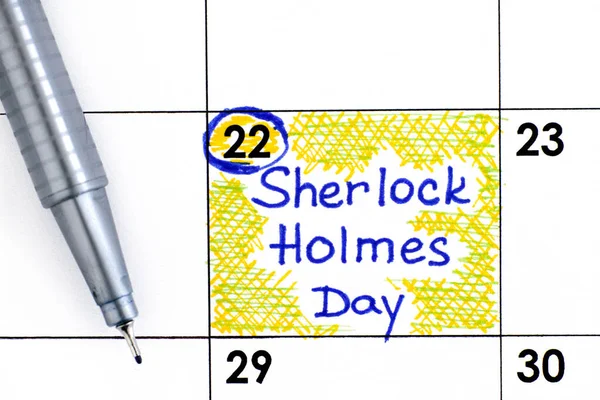 Reminder Sherlock Holmes Day in calendar with pen. May 22.