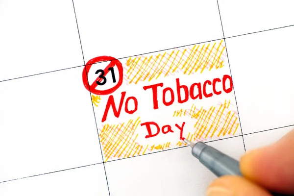 Woman Fingers Pen Writing Reminder Tobacco Day Calendar May — Stock Photo, Image