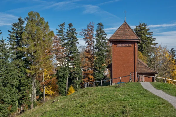Old church and autumn trees near mount Rigi, Alps — Stock Photo, Image