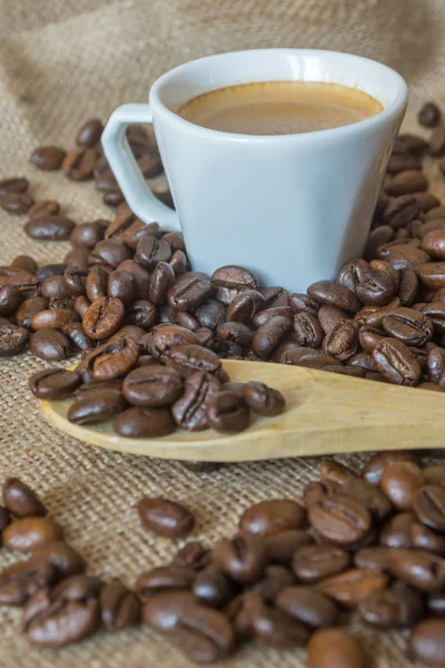 Cup and grain of coffee — Stock Photo, Image