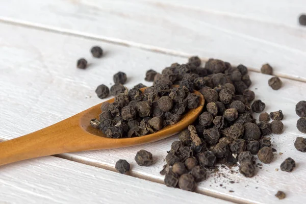Closeup view of black pepper corns — Stock Photo, Image