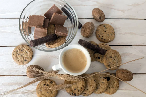 Cup of coffee, cookies, walnut and chocolate — Stock Photo, Image