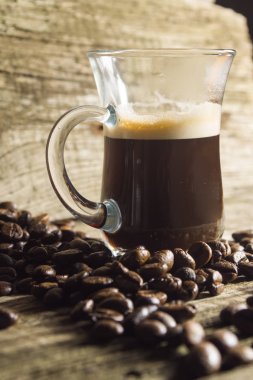 Kupası ve kahve tanesi