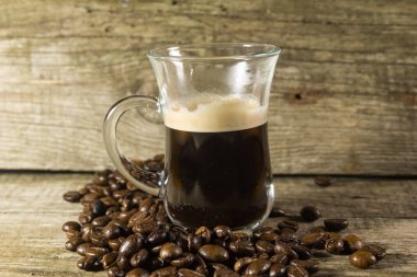 Kupası ve kahve tanesi