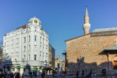 PLOVDIV, BULGARIA - JANUARY 2 2017: Dzhumaya Mosque and cental street in city of Plovdiv clipart