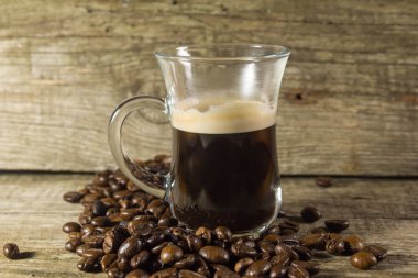 Kupası ve kahve tanesi