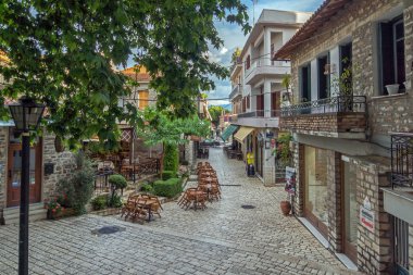 PATRAS, GREECE - MAY 28, 2015:  Typical street in nafpaktos town clipart