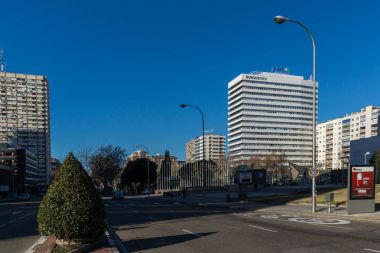 MADRID, SPAIN - JANUARY 21, 2018:  Business buildings at Paseo de la Castellana street in City of Madrid, Spain clipart