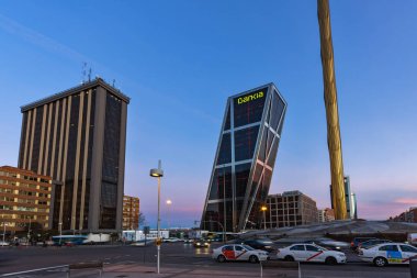 MADRID, SPAIN - JANUARY 23, 2018:  Gate of Europe (KIO Towers) at Paseo de la Castellana street in City of Madrid, Spain clipart