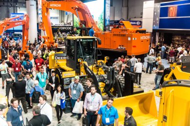 Heavy construction equipment display at Con Expo clipart