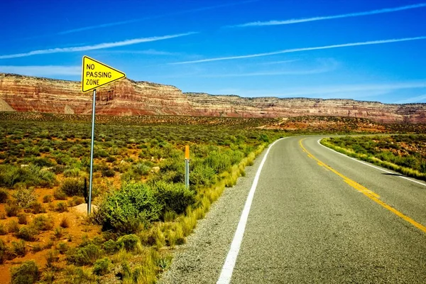 Highway sign warns of dangerous road approaching Moki Ducky and Cedar Mesa