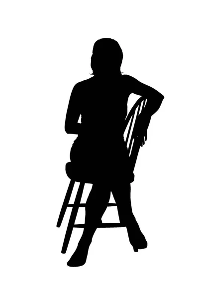 자에 앉아있는 여자의 실루엣 — 스톡 사진