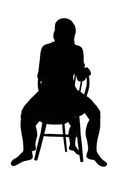 Silhouette of a woman sitting on a chair — Stock Photo, Image