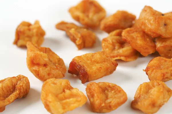 Fried pieces of pork rind and fat — Stock Photo, Image