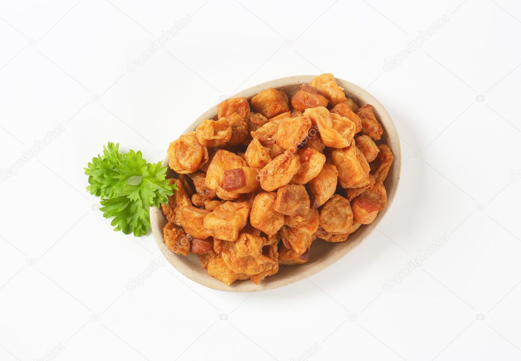 Fried pieces of pork rind and fat Stock Photo by ©ajafoto 125045842