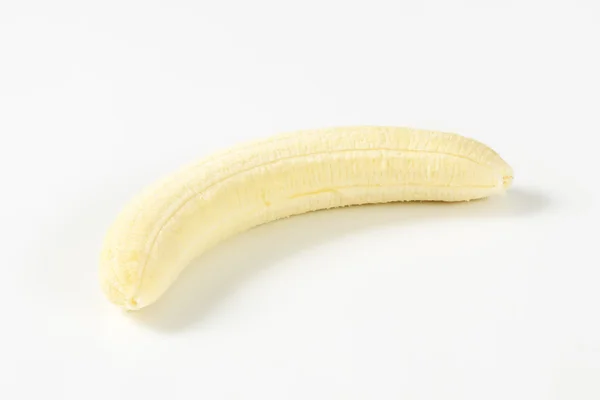 Banana inteira descascada — Fotografia de Stock