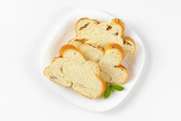 Slices of Christmas sweet braided bread — Stock Photo, Image