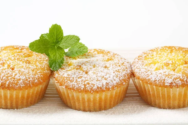 Pudding filled lemon cupcakes — Stock Photo, Image