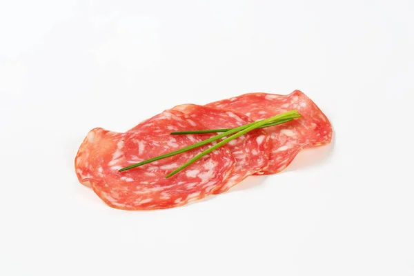 Slices of dry salami — Stock Photo, Image
