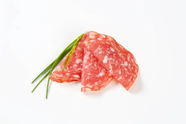 Slices of dry salami — Stock Photo, Image