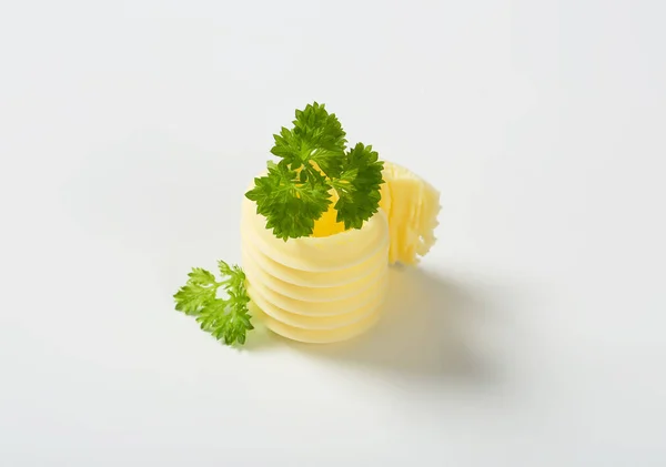 Butter curl with parsley — Stock Photo, Image