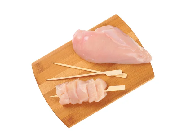 Raw chicken breast and skewers — Stock Photo, Image