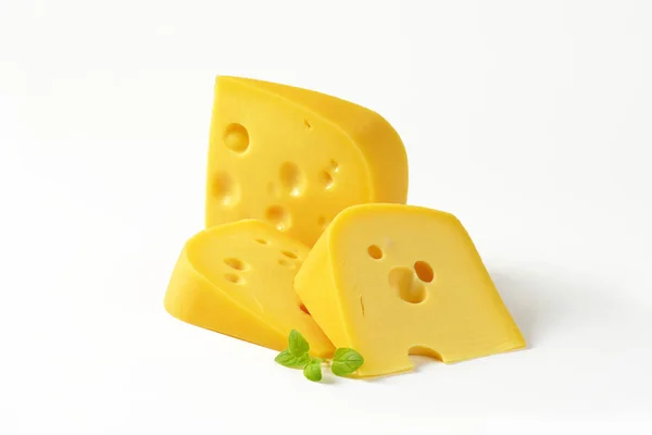 Клинья швейцарского сыра — стоковое фото