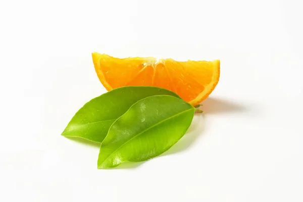 Single orange wedge — Stock Photo, Image