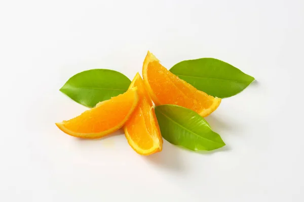 Fresh orange wedges — Stock Photo, Image