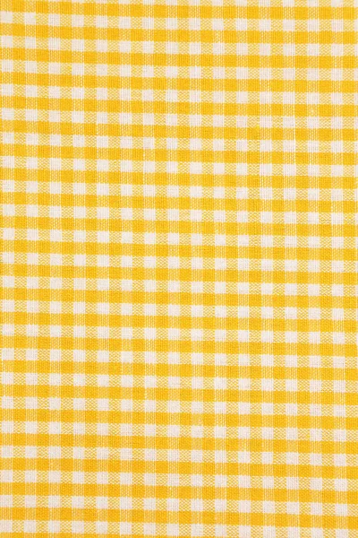 Fundo de pano de mesa amarelo e branco — Fotografia de Stock