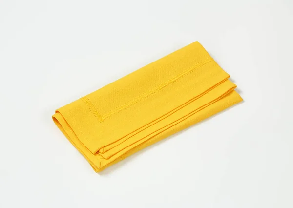Gele doek placemat — Stockfoto