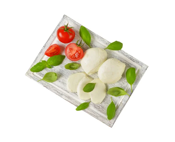 Mozzarella, tomatoes and fresh basil — Stock Photo, Image