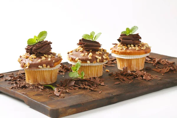 Hazelnut muffins with chocolate topping — Stock Photo, Image