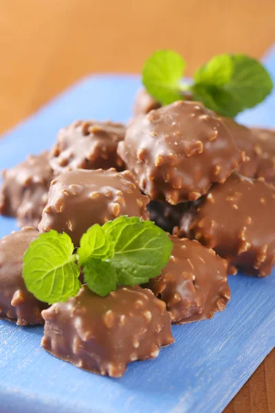 Chocolate-covered marzipan squares — Stock Photo, Image