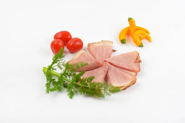 Folded ham slices and vegetables — Stock Photo, Image