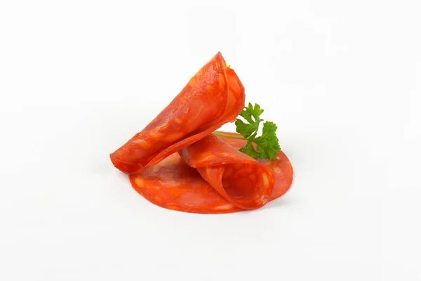 Plasterki chorizo salami — Zdjęcie stockowe