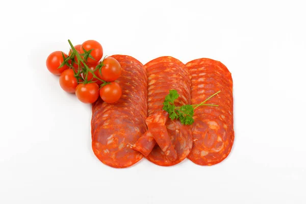 Хорізо салямі і вишневі помідори — стокове фото