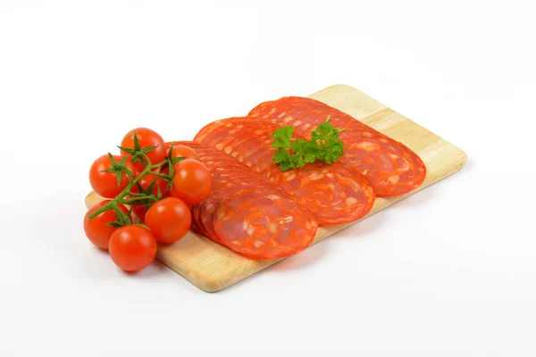 Chorizo, salami en kerstomaatjes — Stockfoto