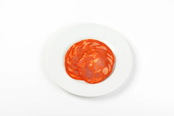 Plasterki chorizo salami — Zdjęcie stockowe