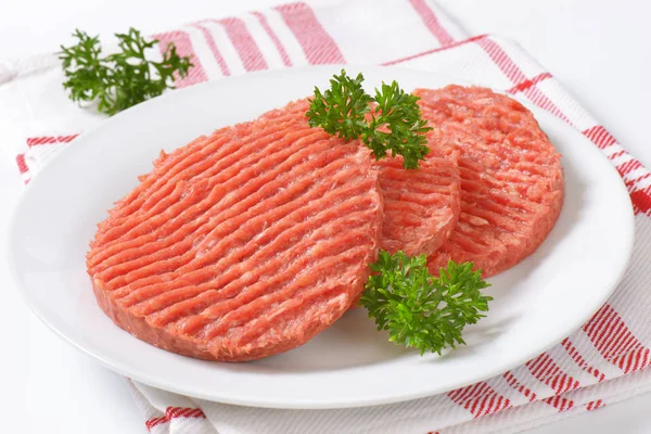Ruwe hamburger pasteitjes — Stockfoto