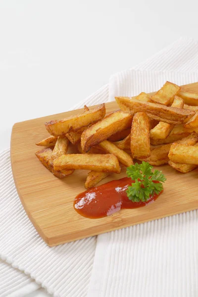 Fried chipped potatoes — Stock Photo, Image