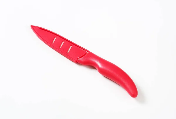 Red ceramic kitchen knife — Stock Photo, Image