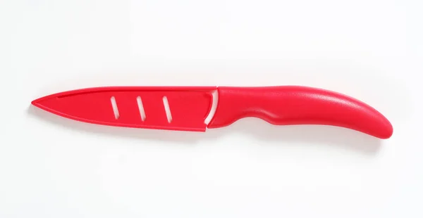Red ceramic kitchen knife — Stock Photo, Image