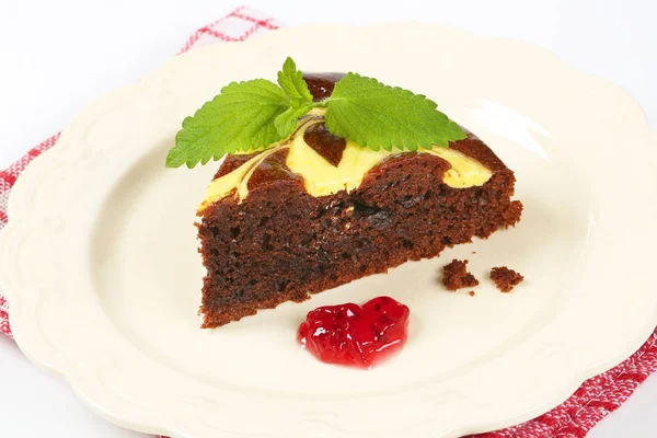 Slice of chocolate cake with cheese — Stock Photo, Image
