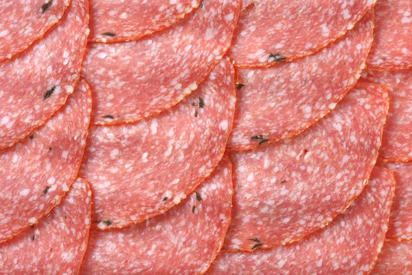 Slices of spicy salami — Stock Photo, Image
