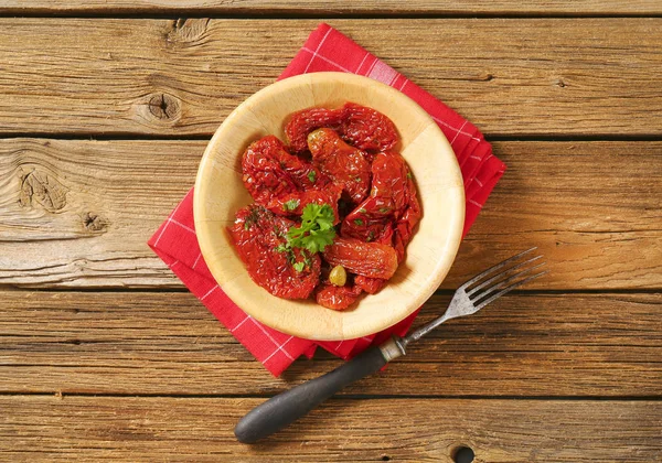Plate of dried tomatoes — Stock Photo, Image
