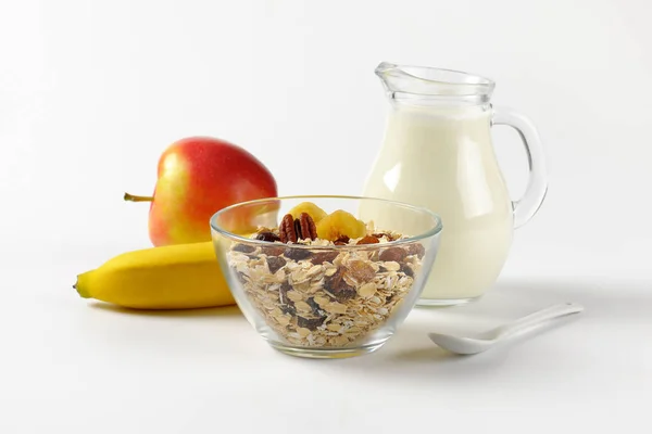 Oat flakes, milk and fruit — Stock Photo, Image