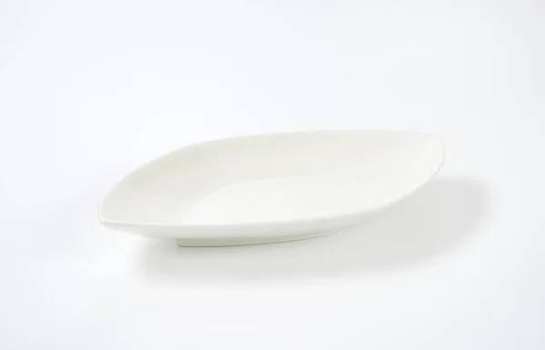 Diamond shaped white dinner plate — Stock Photo, Image