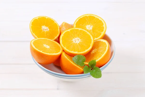 Pile of halved oranges — Stock Photo, Image