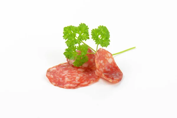 Thin slices of salami — Stock Photo, Image